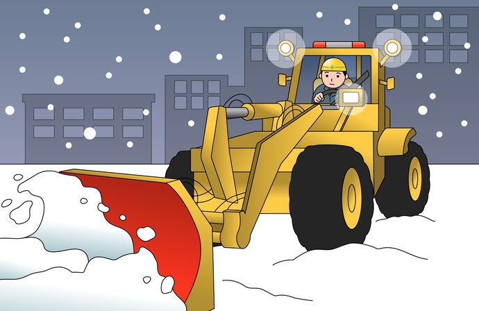 写真：深夜の除雪作業の様子